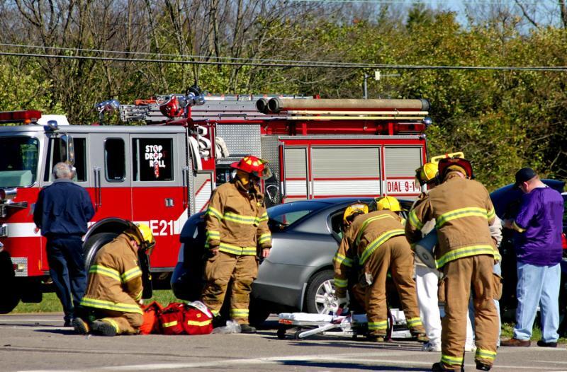 fire fighters at work on the scene of accident